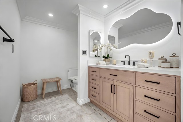 Primary suite's ensuite. Virtually staged. Primary suite's ensuite. Virtually staged.