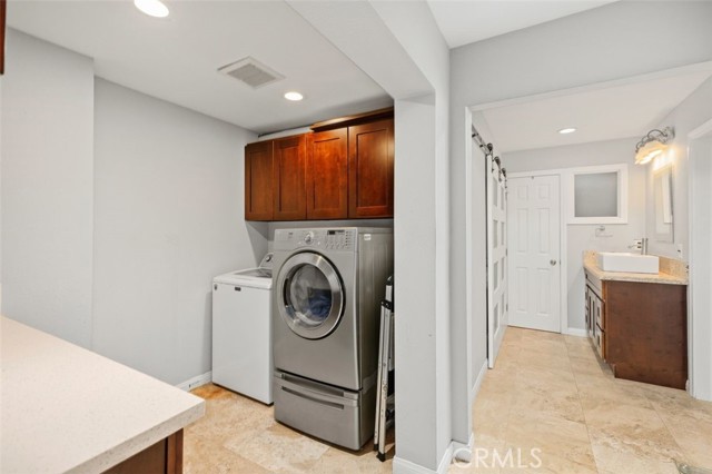 LAUNDRY ROOM AREA ON LOWER LEVEL