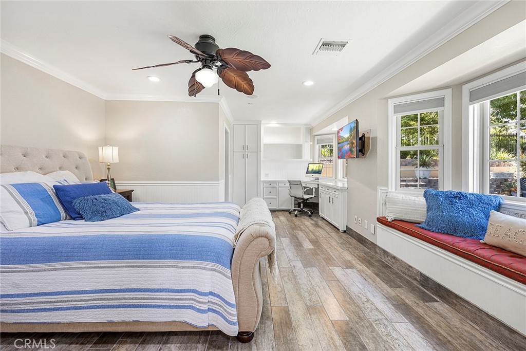 This secondary bed is oversized looking out the Bay window, and built-in window seat with nature everywhere. “Serenity awaits”