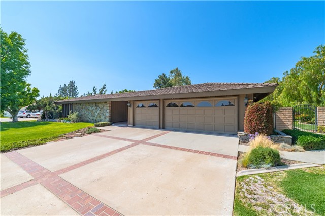 3 car garage and long drive way