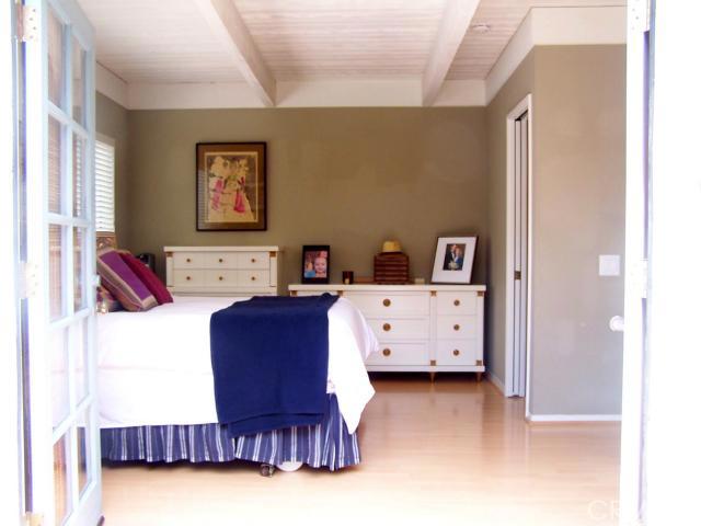 French Doors from Private Deck Open To Master with Walk-in California Closet, Complete with Laundry Chute to Downstairs Laundry Area where you will find a Fabulous Bonus Room with Fold Down Drying Rack and Utility Sink. Bonus Room with separate entry currently being used for Crafts, Wrapping, Garden, Tools. (Can possibly be converted into 3rd bedroom for teenager).