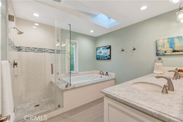Primary bathroom with Soaking Tub and separate commode room