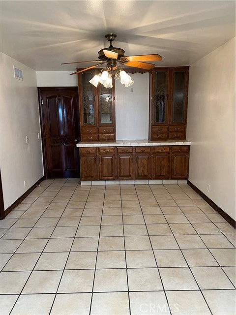 Dinette area off the kitchen. Door leads to garage and laundry area