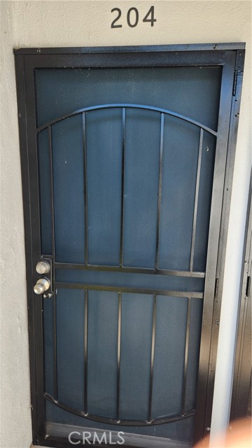 Front door has security/privacy screen