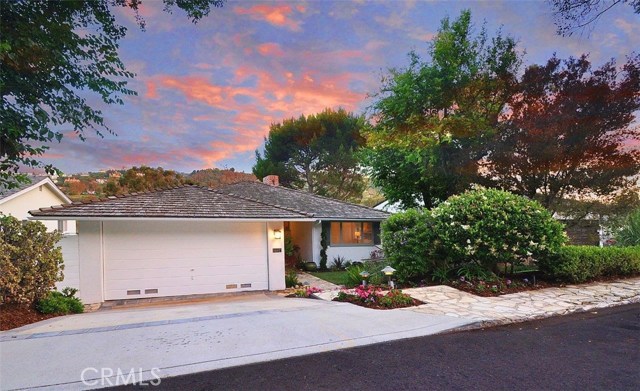 This large cottage style home has wonderful curb appeal.