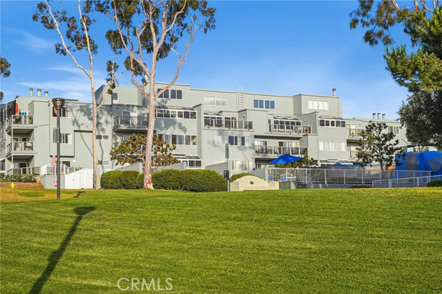 The home overlooks the pool and park area