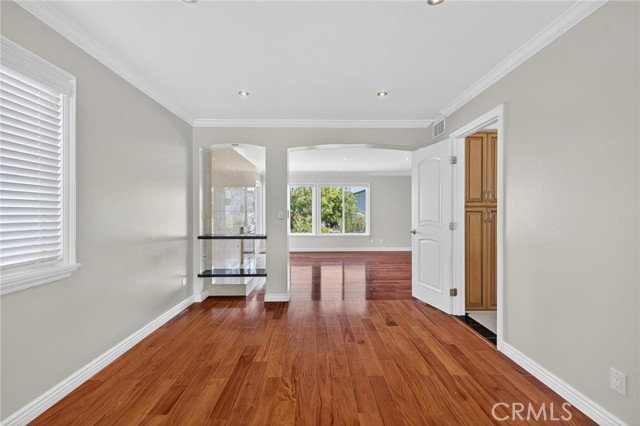Living room leads to formal dining area