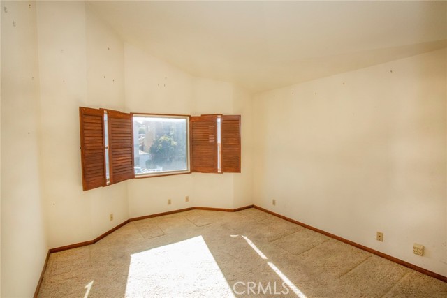 Bedroom #3: Vaulted ceiling and Window w/shutters