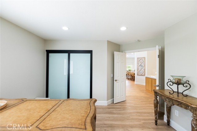 This is the view from the 4th bedroom looking toward the wet bar and great room area.