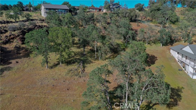 Opportunity Awaits at this nearly half an acre parcel with plenty of trees for shade and privacy! Approved soils analysis on file! Located in the beautiful community of Hidden Valley Lake, just 20 miles north of Calistoga. Association Amenities include: parks, fishing piers, beaches, marina, clubhouse, pool , tennis, hiking trails, pro shop + driving range, 18 hole championship golf course, restaurant and more. The good life awaits!