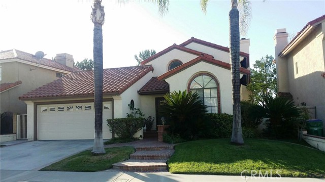 21052 Ponderosa Mission Viejo, California Architectural digest style home. Main floor master bedroom and 2nd bedroom on main level. 3rd bedroom on second level. Second level bedroom has spacious view balcony. Spacious master bedroom with ensuite luxury bathroom and a second bedroom plus hall bathroom. High volume ceilings, large open kitchen with room for dinette, hardwood flooring and planation shutters. Location is close to popular Mission Viejo Lake and walking distance to shopping and restaurants. Located on a quiet cul-de-sac street. Exterior has custom hardscape and panoramic mountain views!