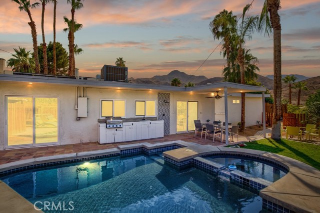 38122 Charlesworth Drive Cathedral City, California Welcome to this well designed compound like no other in the valley. Featuring a main house with both bedrooms opening up to the pool, a casita with its own private outdoor space, AND a bonus detached office, this home has all you could ask for in a desert retreat. Both kitchens have been reimagined with all new custom cabinets, custom crocodile backsplash tile, beautiful quartz stone, new appliances, and fixtures that add the designer touch you've been hoping for in your dream kitchen. The home has been renovated top to bottom with all new flooring, new AC for both dwellings and the office, NEW roof, windows and sliders, texture, lighting, bathrooms, doors, this house will satisfy the most picky buyers. The main house features an open concept design with a dramatic fireplace, charming breakfast nook, designer kitchen, guest bedroom over looking the pool, full guest bathroom, an oversized primary bedroom overlooking the pool, and a fully renovated primary bathroom with sleek modern finishes. The 1/1 ADU features its own bedroom, fully remodeled bathroom, full kitchen, and open living space. The guest house also features its own private entrance and outdoor section with mountain views. Access to the laundry area can be shared by both dwellings without privacy issues. Make this a dream rental opportunity or provide a private guest house for friends and family. The detached office space offers many potential uses. The grounds are part of what makes this home special. Many of the mature cactus and desert plants are decades old and offer a peaceful and tranquil setting on this incredibly private quarter acre lot. The property is tucked into the COVE up against the mountains with hiking trails right outside your front door. The backyard is an entertainers paradise featuring a pebble tech pool and spa, new outdoor kitchen, and shower. With explosive mountain views the backyard leaves nothing to be desired. Homes like this do not come up for sale often, dont let this one get away!
