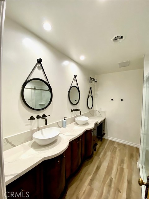 Hallway bath w/custom cabinetry from Mexico