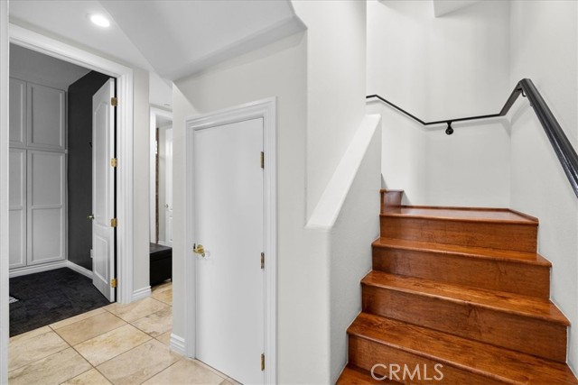 Stairs to upper main living level.
