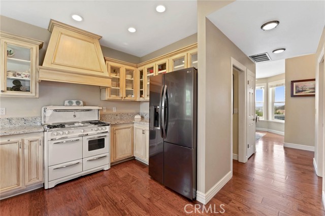 Remodeled kitchen with Wedgewood stove and built ins.