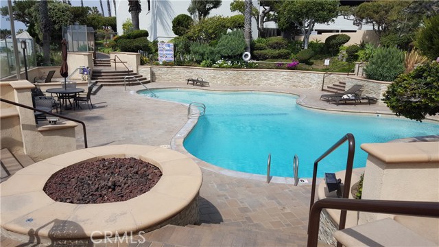 Firepit and heated pool.