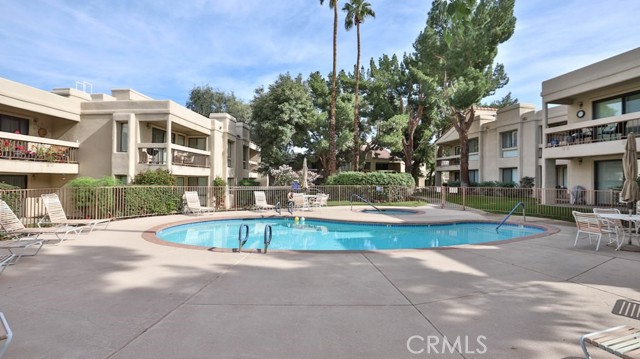 Diamond in the rough! Use your imagination and bring this cute townhouse back to life. Enjoy the desert lifestyle in this gated community with pools and tennis courts.