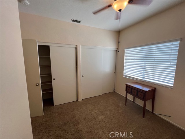 Front bedroom double closets attached restroom with shower