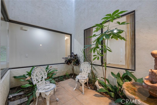 Atrium adjacent to the dining room.  Perfect for a hot tub, or a Zen meditation garden.