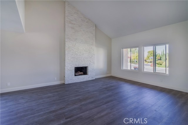 Another angle of Living Room with Marble Fireplace