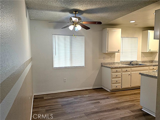 Dining room just off the kitchen as well.