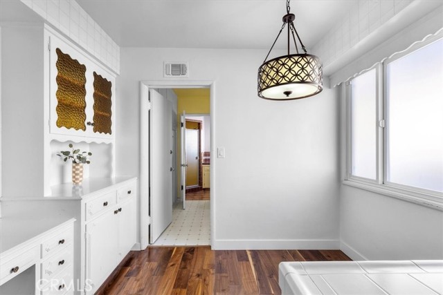 Charming built in shelves and cabinets in the breakfast nook.