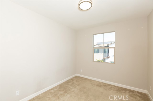 Secondary bedroom 1, view from hallway