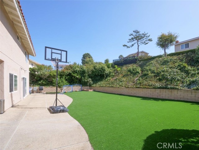 Private Backyard with Patio & Artificial Turf