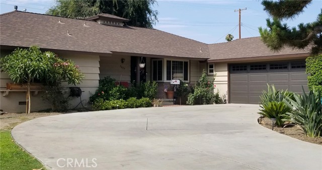 1637 E Portner Street West Covina, California Beautiful home located perfectly in the center of West Covina! The home includes stunning hardwood floors across the dinning room and living room. The spacious living room comes with a fireplace and a sliding door accessing the backyard. The kitchen has built-in appliances, a breakfast nook, and a large pantry ready to fill with all the delicious food! The Master bedroom has two closets and a master bath with a newer vanity and tile floor. Outside the home, you will find a backyard with pavers and a shed with plenty of room for storage! The Front yard is large and nicely manicured!