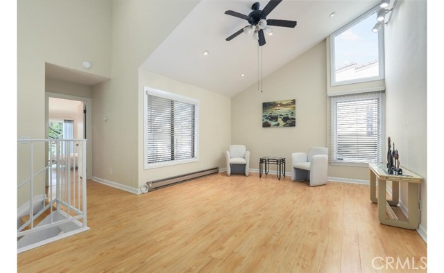 Upstairs you'll find your massive family room with cathedral ceilings, ceiling fan and spare enclave for more space!