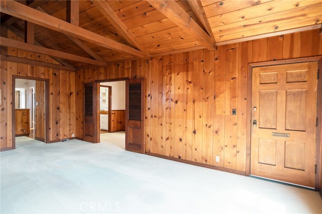 Front Door and Opening to Formal Dining and the Den Front Door and Opening to Formal Dining and the Den