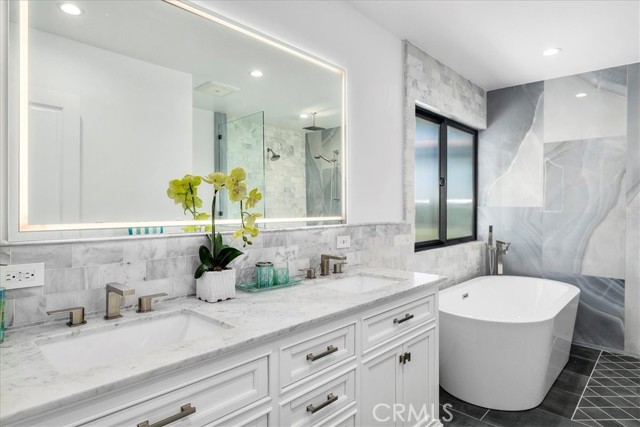 Gorgeous master bathroom with soaking tub and walk-in shower