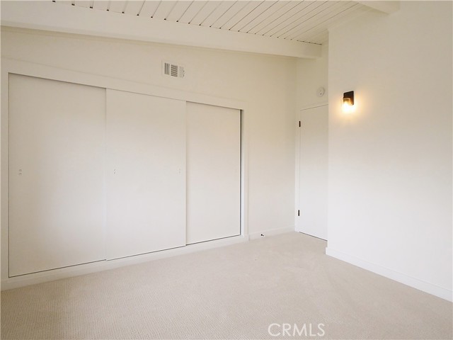 Guest bedroom 2 facing closet area