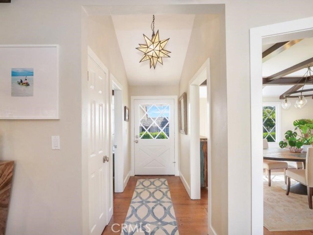 Inviting entry area with raised ceiling.