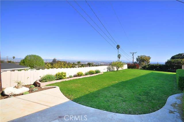 Look at that big flat yard with views.
