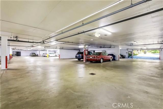 The Large Secure Garage has Two Entrances on the West and East Side of the Building with Very Easy Access to the Two Parking Spaces for the Unit. There are also Several Very Large Community Storage Rooms in the Garage which are Available to the Owners in the Building for all of the Personal Items which you may not want to keep in Your Unit.