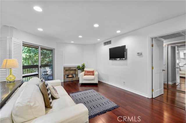 Glass sliding door leading onto the deck from the living room.