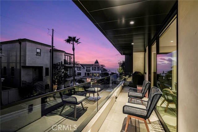 Ocean view deck that is accessed from either the primary or one of the secondary bedrooms on the 2nd floor