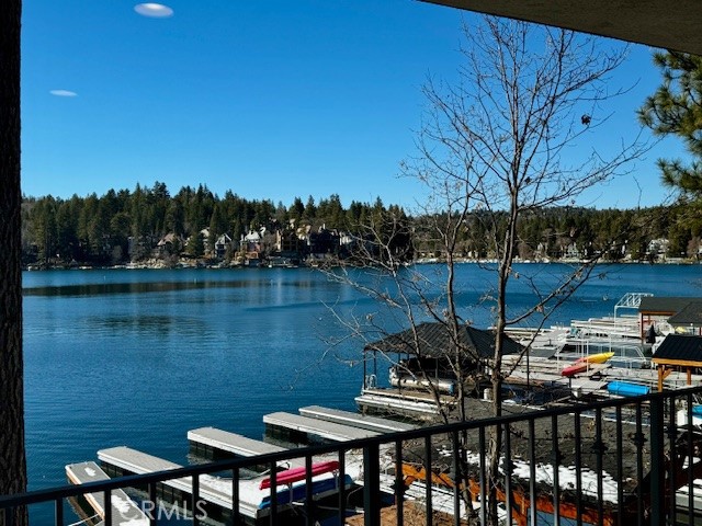 Lake Arrowhead's Best Kept Secret!  Just Listed a Turnkey Gated Lakefront Condo with Dock Slip and Furnishings Ready to Go for Summer Fun! Absolutely Pristine, 342 Lake Resort has 2 Oversized Bedroom Suites with 8x8 walk in closets, 2.5 baths, Laundry, Stainless Appliance Kitchen with Counter Island Bar, Mudroom Entry with Storage, and a 2 Space Carport Immediately Adjacent to level Front Foyer access. Beautiful Glimmering Lake Views From Each Room.  This Home Has Been Kept Pristine and Tidy, Adorned With Mountain Charm.  A Lower End Unit With Full Length Decking and Unique Privacy, Close to Both Burnt Mill Beach and Resort End Dock Slip. Park and Walk to All Dining, Stores, Entertainment, and Make Use of Day Use of Resort Spa, or the Resort Fine Dining and Bar, or a Cup of Coffee in the Lobby.  Owner's Of These Condos Love the Convenience and Neighbors this Community Offers. Easy In and Easy Out.  Low Maintenance Vacationing at it's Finest!