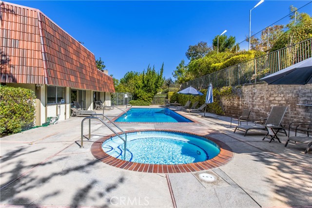 HOA has pool, spa next to club house with rec room weight room and separate saunas