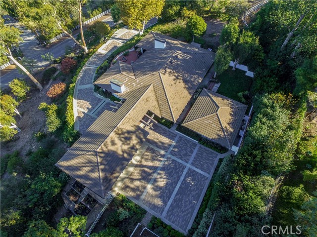 Aerial View showing Large Garage and Parking, Raised Rose Garden Beds and Wagon Lane