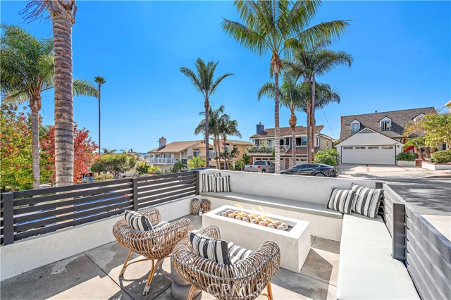 Front yard courtyard is another great space for lounging by the fire with peek a boo ocean views.