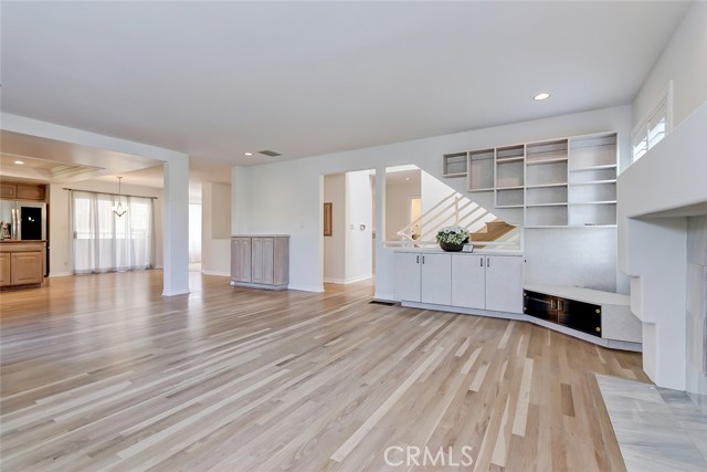 Wood floors, fireplace in spacious family room