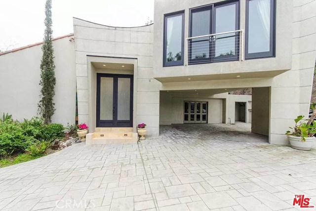 1465 Donhill Drive Beverly Hills, California Views, Privacy, Development Opportunity and Live In now. 5 BR, 7 Bath 6,378sf early 2000 updated estate on a 91,000sf lot zoned RE15 in one of the tony Beverly Hills locations off North Beverly Drive. Nearly 300 degree views of Downtown to Santa Monica located at the end of a quiet cul-de-sac street. Investment opportunity, Development Phase 1: Seller has city approved plans with permit RTI for approx 11,300 SF estate with 5 car garage with approx 1,200 SF guesthouse. The plans incorporate all amenities for the house having 8 BR, 12 BA, 3 kitchens, gym, saunas/steam, office/library, 20 FT high ceilings, 2 laundry rooms, wine chamber, stadium theater, large masterbedroom with separate his and her bathrooms, infinity pool and spacious backyard. Development Phase 2: Seller hired Expert Expediter who has received verbal indication from the city of Beverly Hills that lot split is allowed. Seller has preliminary plans for a lot split of the land with a hillside 15,000 SF house on the second lot which you would own free after securing a legal lot split. New construction home just completed above is on the market for $30+ million. court confirmation of sale required.