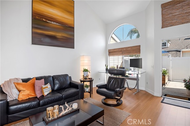 Living room with space for a home office, or a bay window bench facing the patio