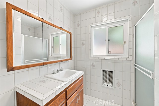 Primary bathroom with wall heater to keep warm on these cold days & nights Primary bathroom with wall heater to keep warm on these cold days & nights