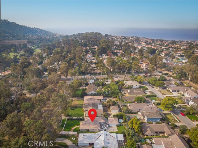 Ariel photo of hills & ocean views