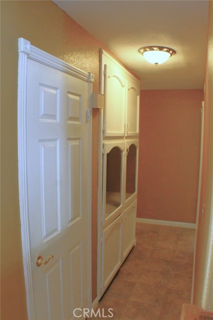 Linen Closet and Linen Cabinets in Hallway.