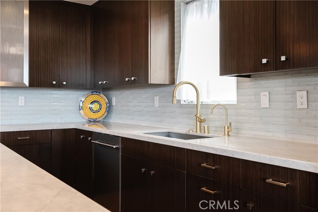 Granite counters with stylish backsplash