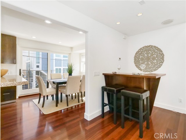 Living Room with Bar and Dining Area
